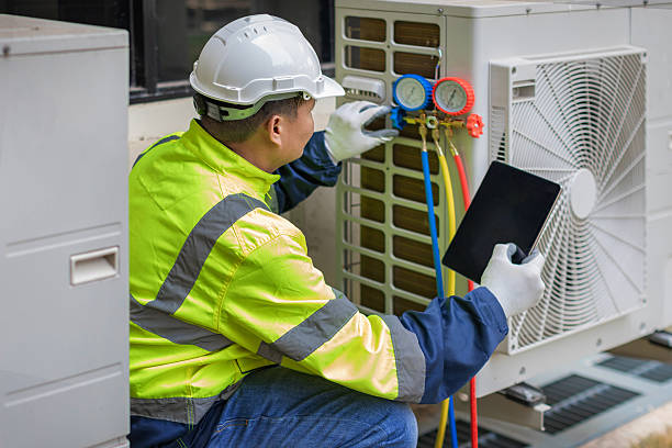 Professional Air Duct Cleaning technician working in Homeland, FL